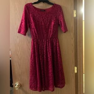 Red lace overlay knee length dress